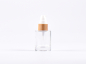 Preview: Glasflasche "Raoul" 30ml, mit Lotionspumpe Bambus